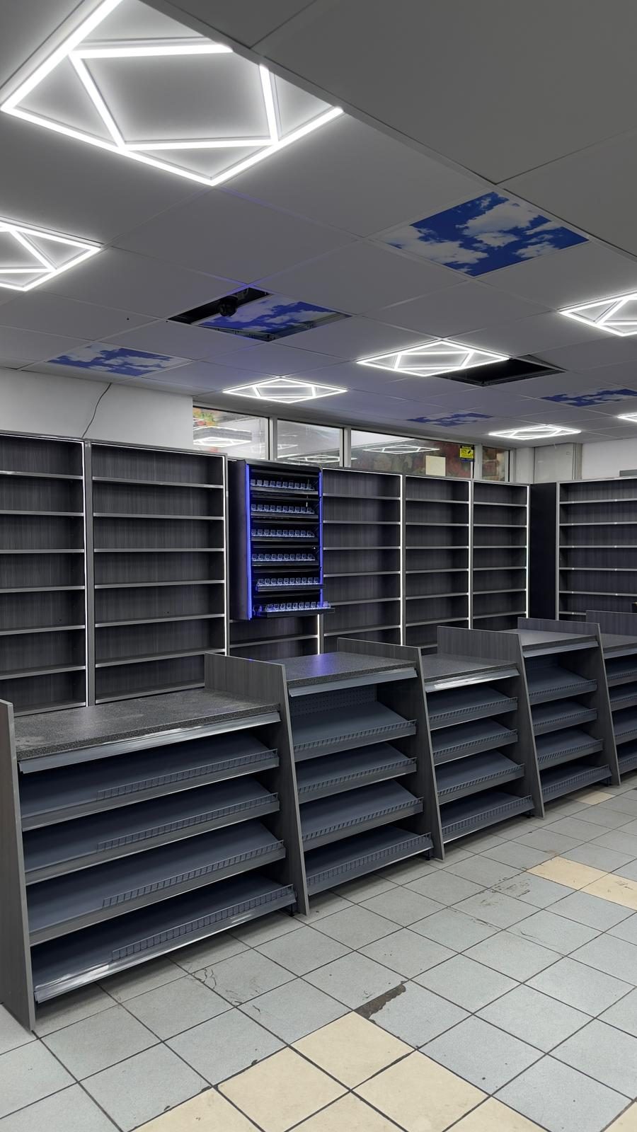Full convenience store refit with shelving and feature ceiling